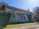 House  DANS UN HAMEAU.