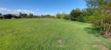 Land  5 mn  pied du centre