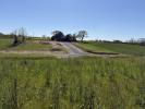 Land  PROCHE DU VILLAGE