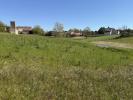 Land  PROCHE DU VILLAGE